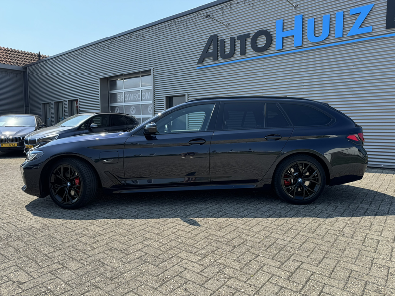 BMW 530 5-serie Touring 530e High Executive M Sport Panora — photo 8