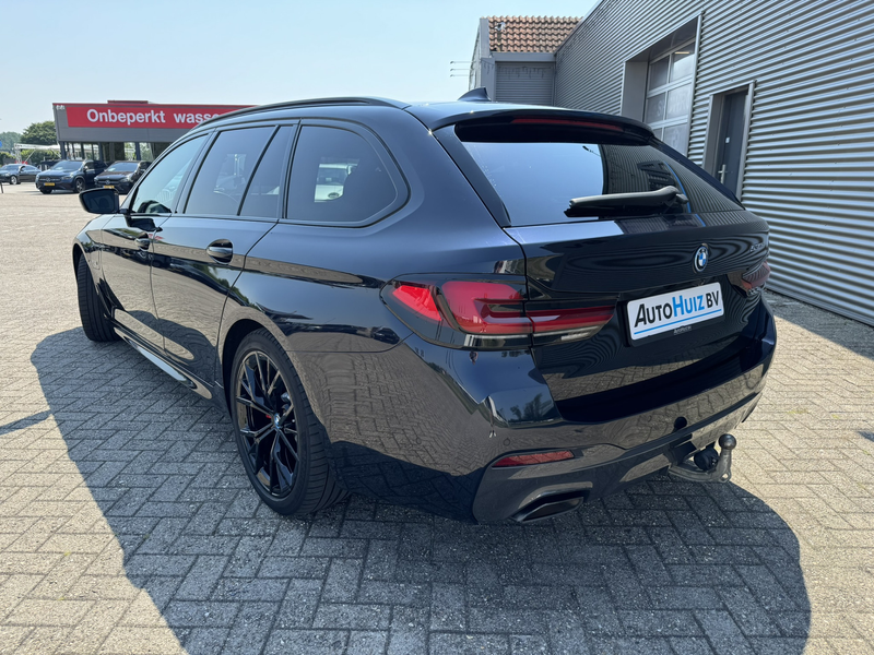 BMW 530 5-serie Touring 530e High Executive M Sport Panora — photo 7