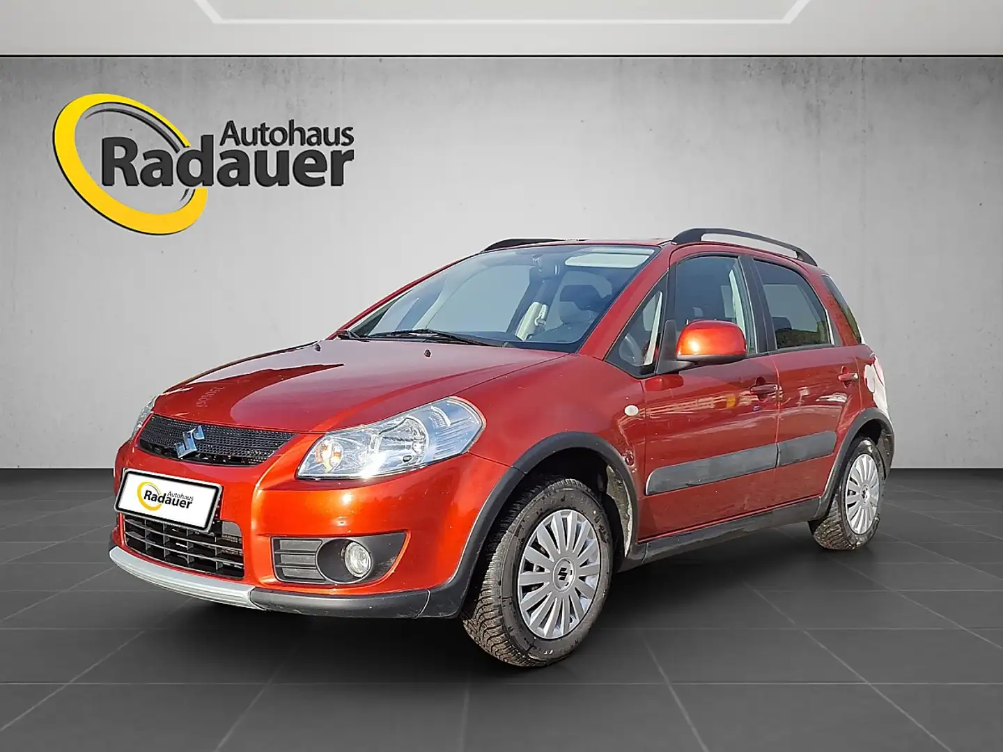 Suzuki SX4 1,6 GLX 4WD Deluxe ESP Orange - 1