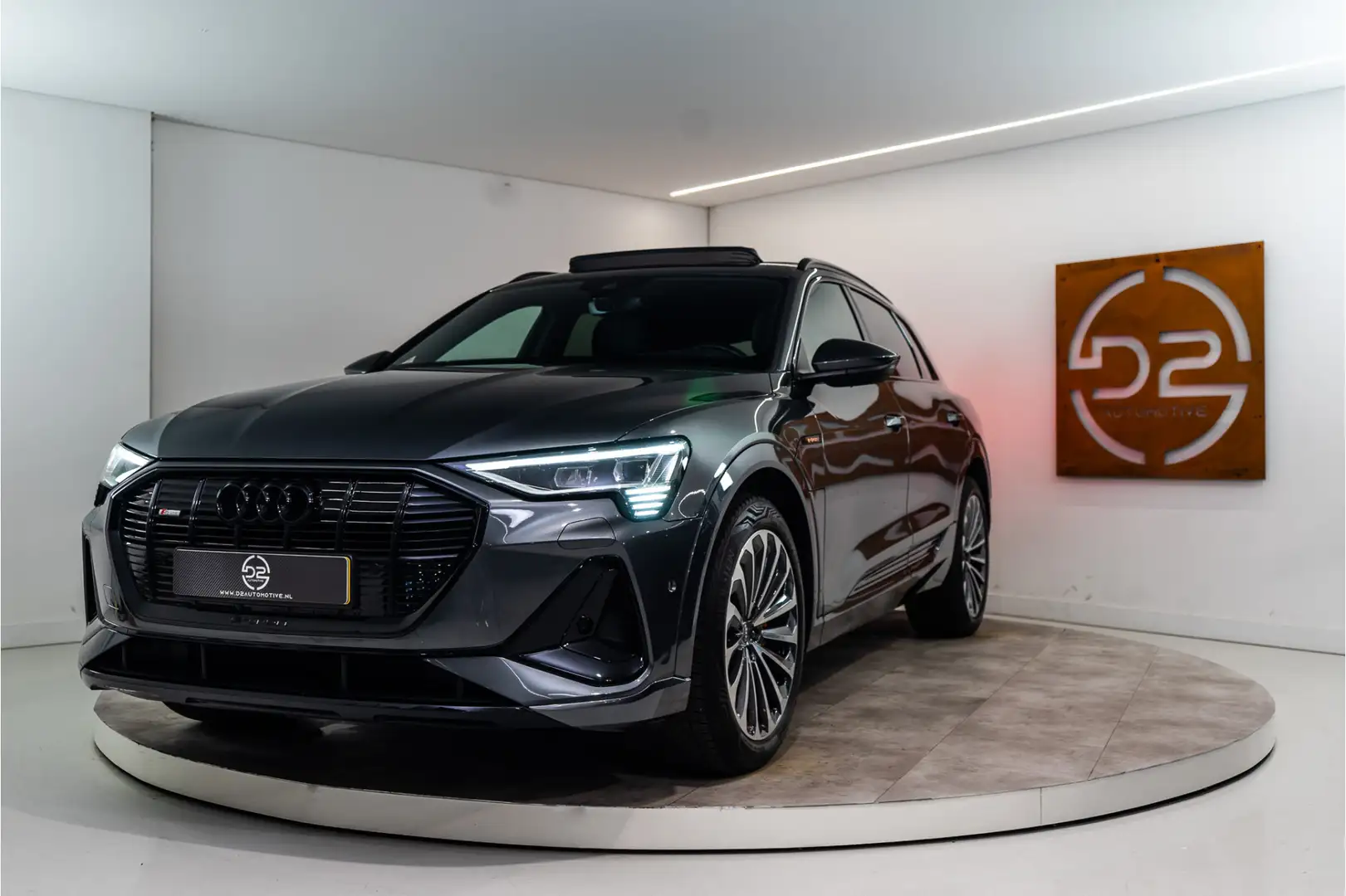 Audi e-tron 55 Quattro S-Edition 95 kWh 408PK | NL AUTO+NAP | Grijs - 1
