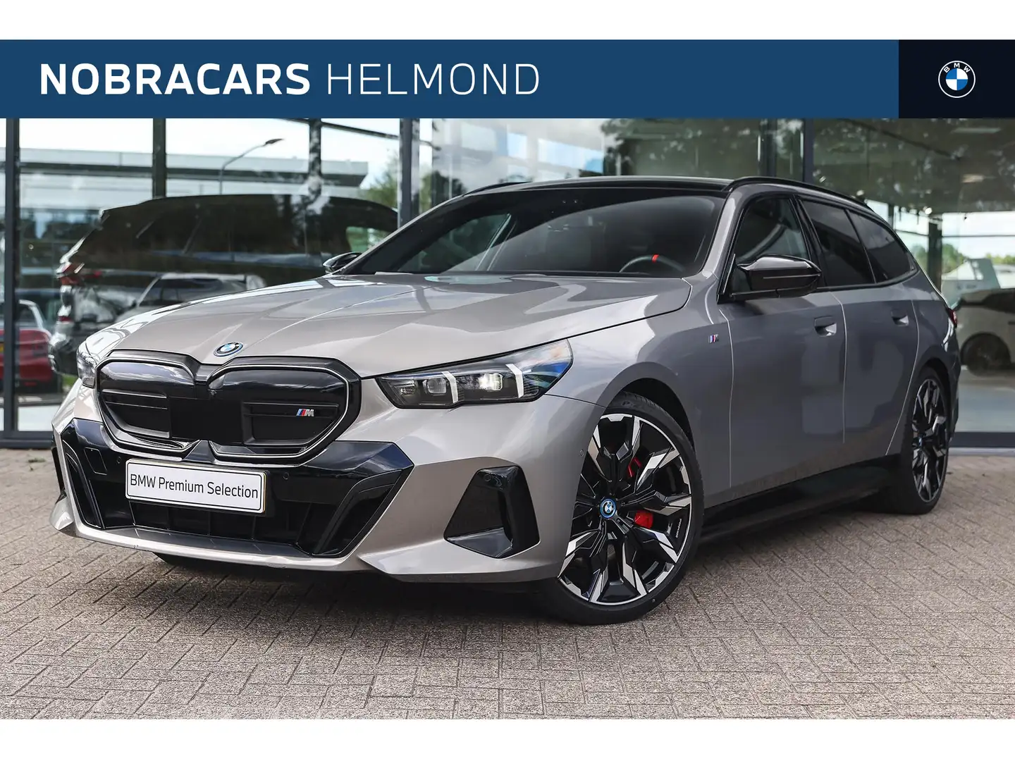 BMW i5 Touring M60 xDrive M Sport / Panoramadak / Trekhaa Grijs - 1