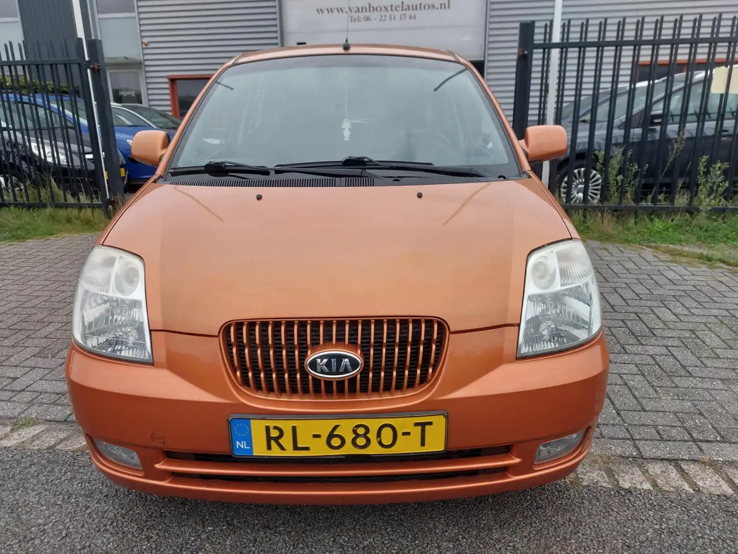 Kia Picanto 1.1 X-tra 5 deurs + geregelde airco Oranje - 2