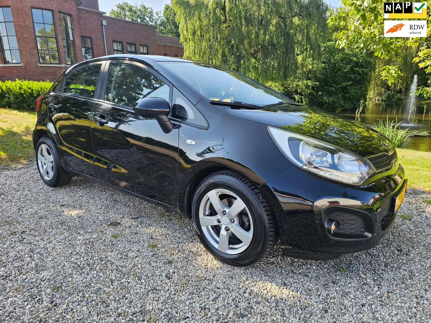 Kia Rio 1.2 CVVT Business 5-deurs AIRCO *apk:06-2026* Zwart - 1