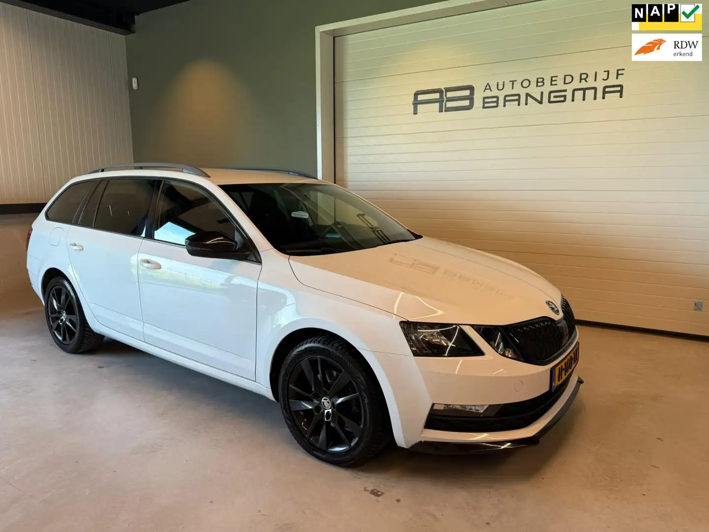 Skoda Octavia Combi 1.5 TSI DSG-AUTOMAAT GREENTECH SPORT BUSINES Wit - 1