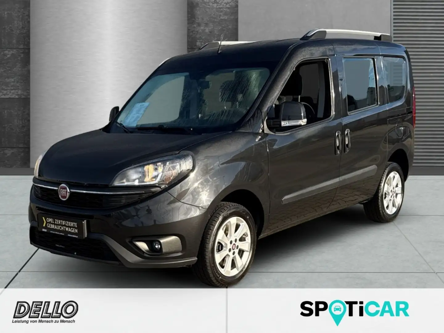 Fiat Doblo Lounge 1.4 PDC+Kamera Navi Allwetter Klima Sitzh. Zwart - 1