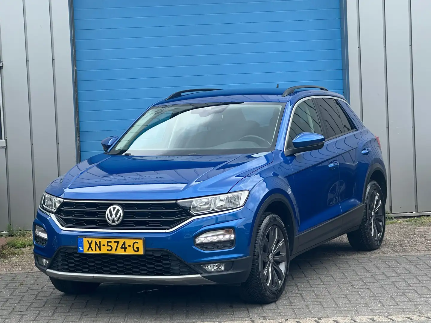 Volkswagen T-Roc 1.0 TSI NAVI PDC TREKHAAK Blauw - 1