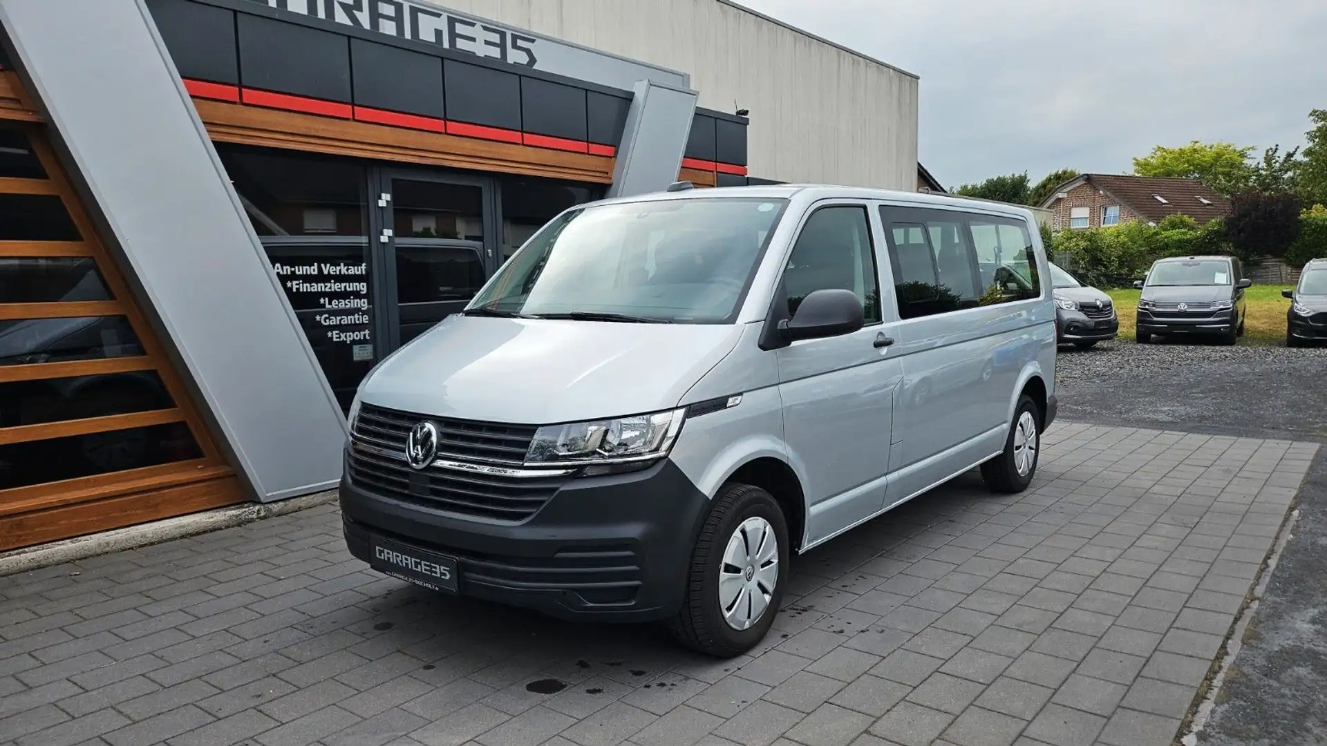 Volkswagen T6 Kombi T6.1 Transporter Kombi lang FWD/9SITZER/NAVI Argento - 1