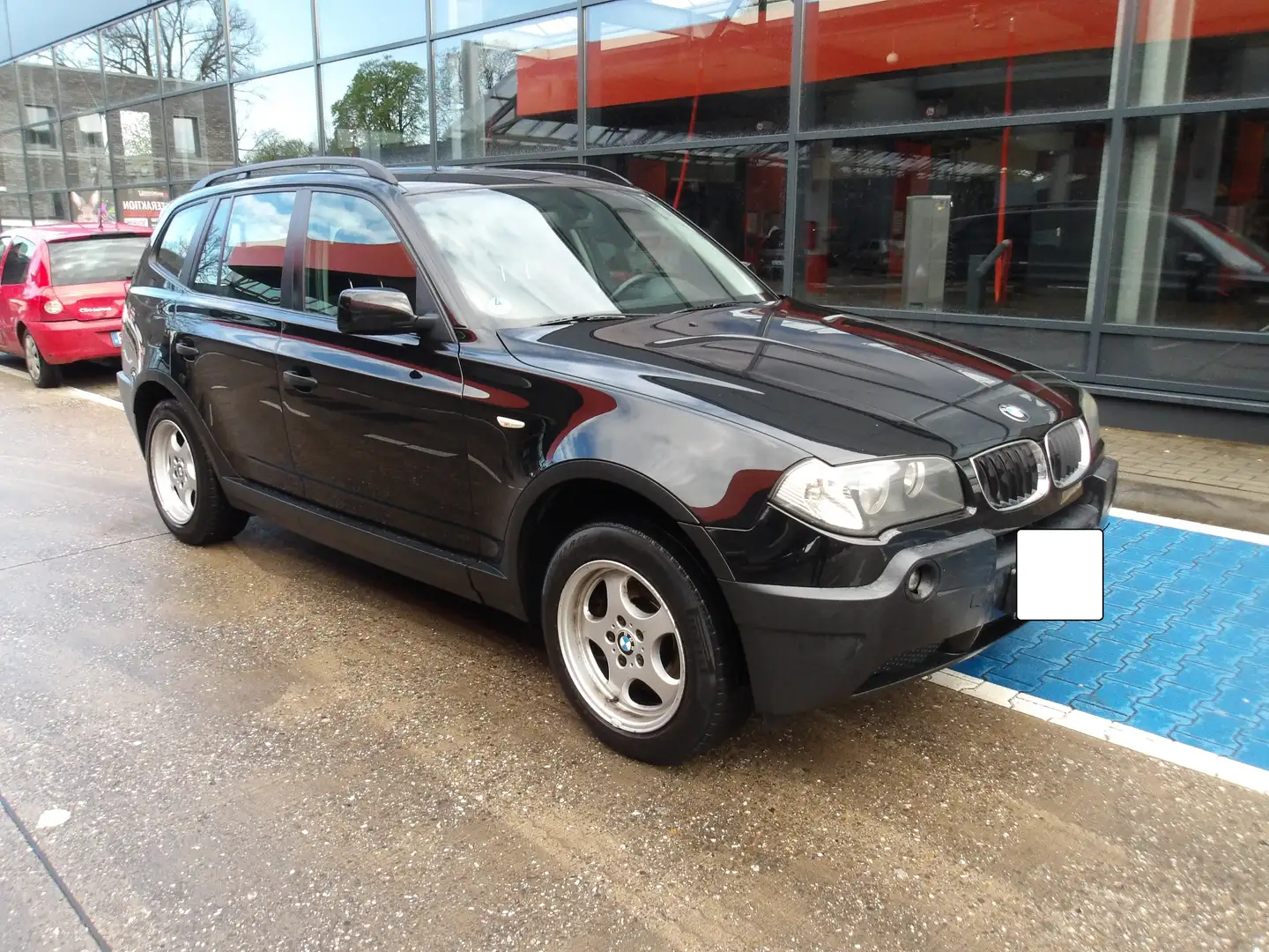 BMW X3 2.0d 2-Hand  Allrad-Panoramadach Noir - 1