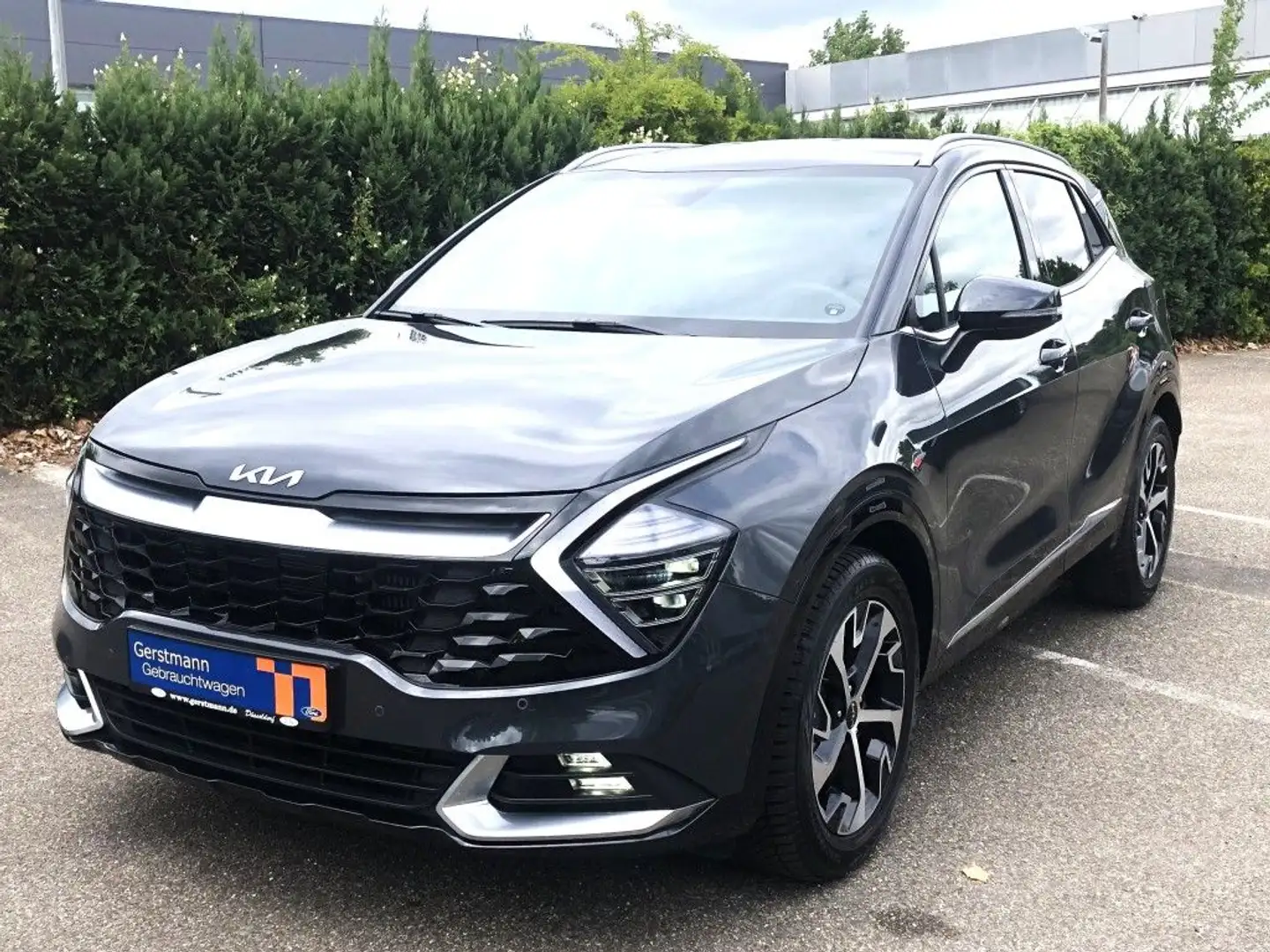Kia Sportage 1.6 T-GDI 2WD (48V M-H) DCT Autom. Spirit Grijs - 1