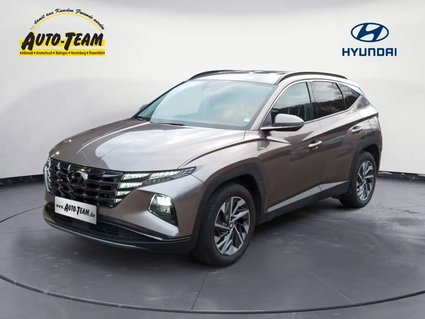 Hyundai TUCSON 1.6 CRDi 48V-Hybrid 4WD DCT Trend AHK Bronze - 1