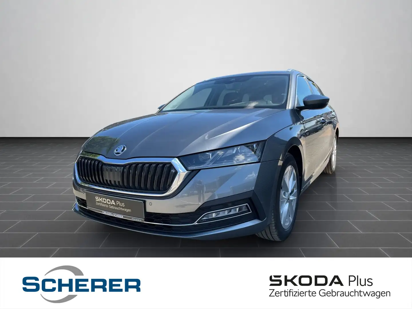 Skoda Octavia Combi 1.5 TSI DSG Style NAVI SHZ RFK MAT Grijs - 1