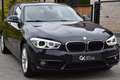 BMW 116 i Facelift 2 JAAR GARANTIE Navi Xenon Cruise PDC ! Zwart - thumbnail 1