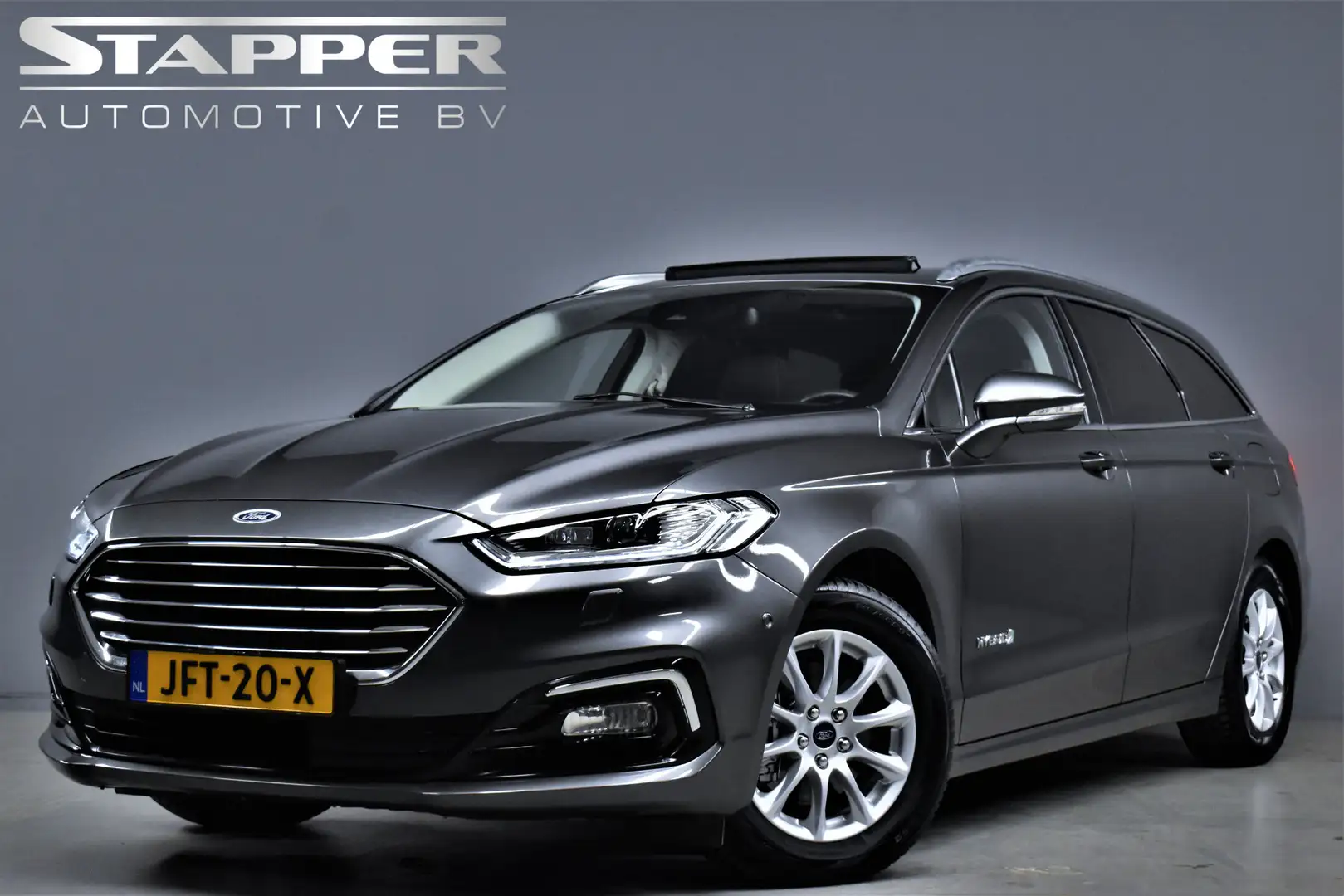 Ford Mondeo Wagon 2.0 IVCT HEV 187pk Automaat Titanium Pano/Ca Gris - 1