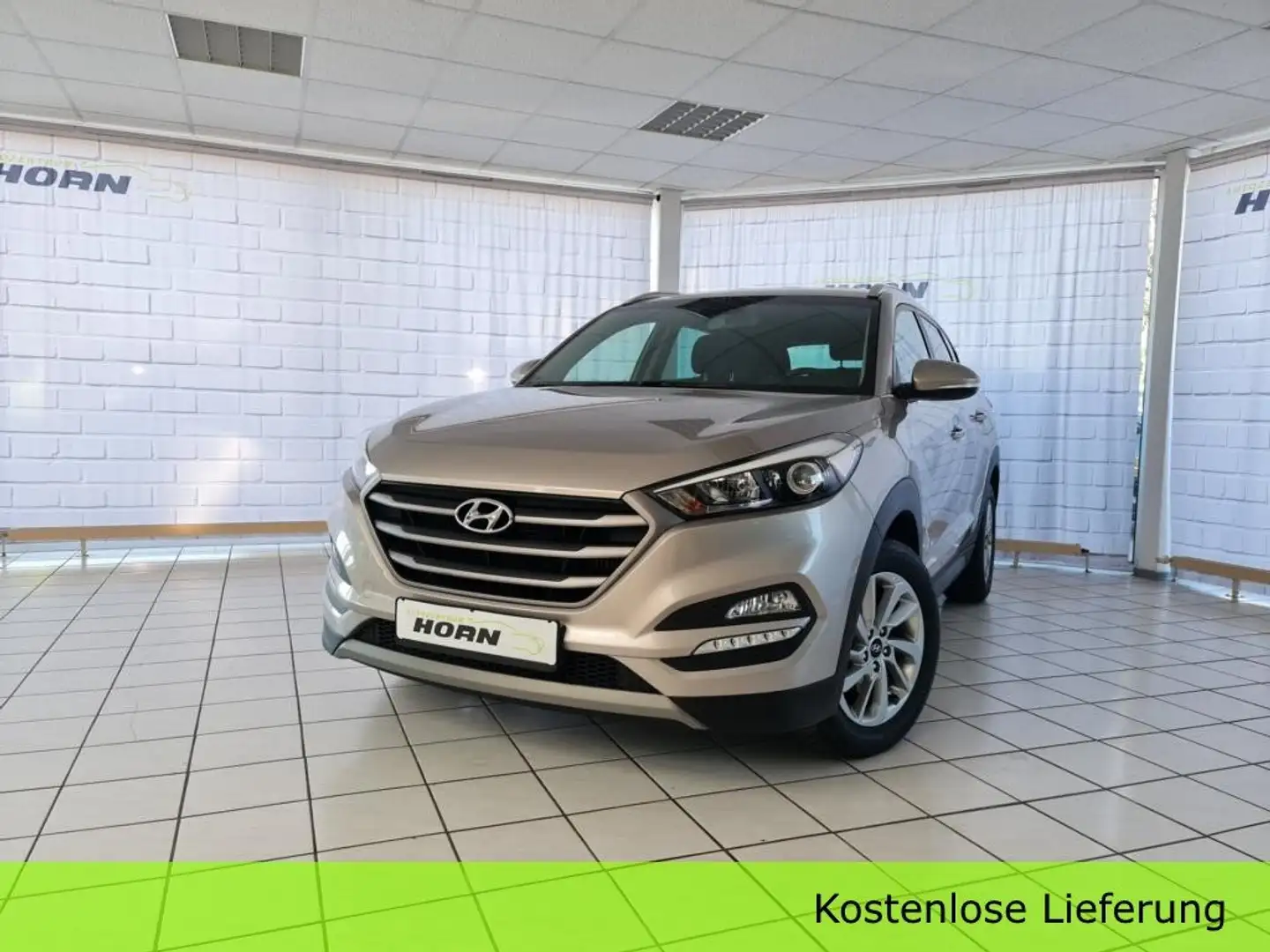 Hyundai TUCSON 2WD, unfallfrei, LMF, Navi, Kamera, Scheckheft Beige - 1