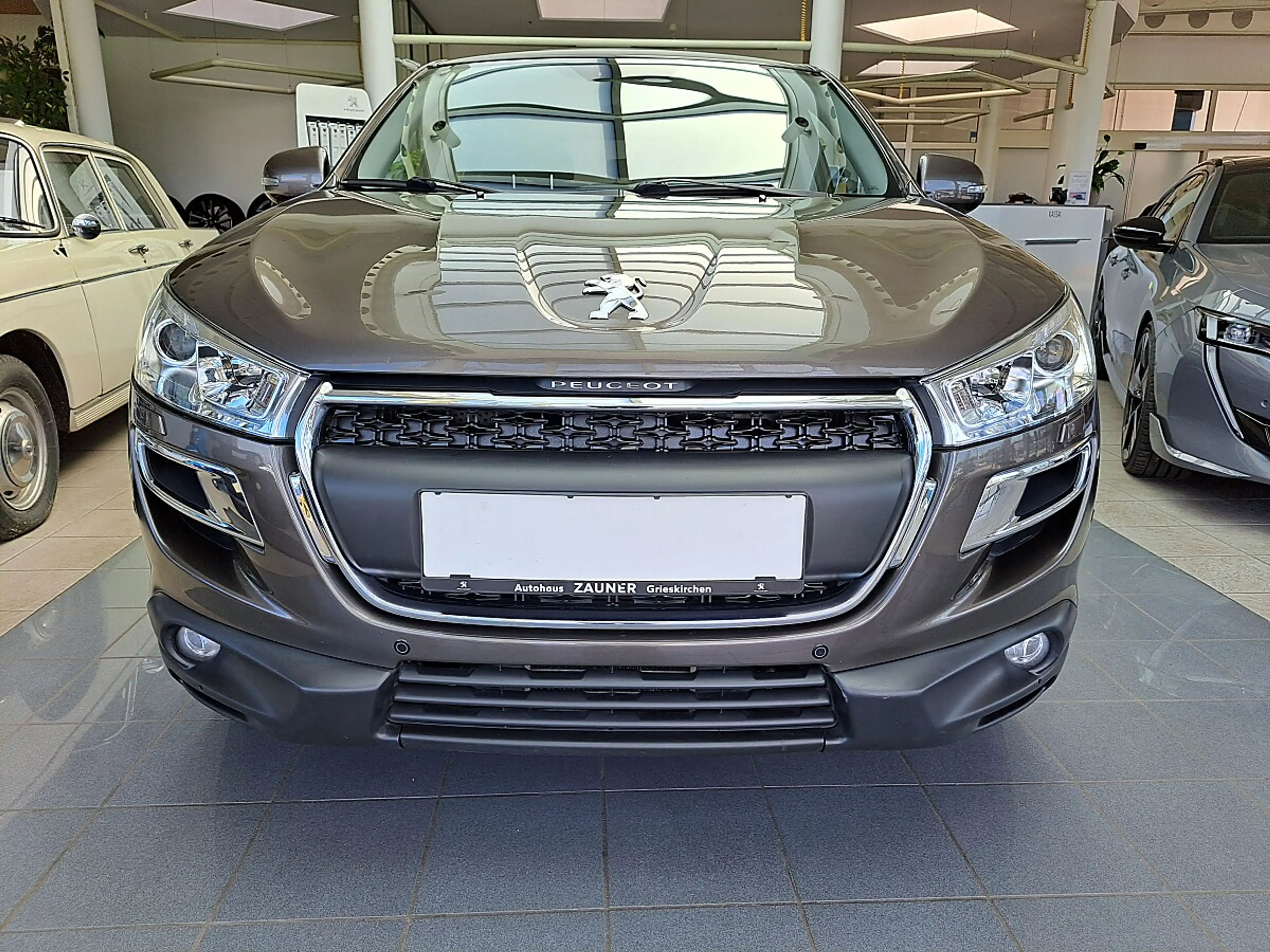 Peugeot 4008 1,6 HDi 115 FAP Allure Allrad — photo 8