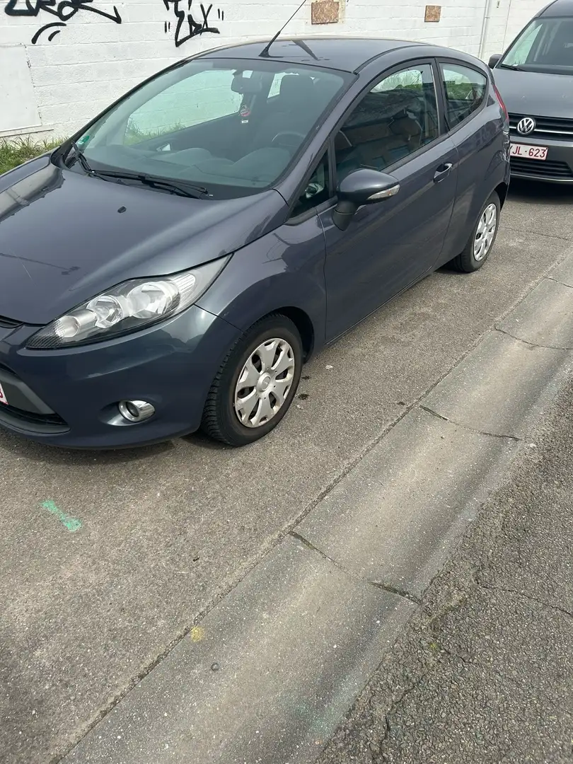Ford Fiesta 1.6 TDCi Sound Connection ECOnetic Blauw - 1