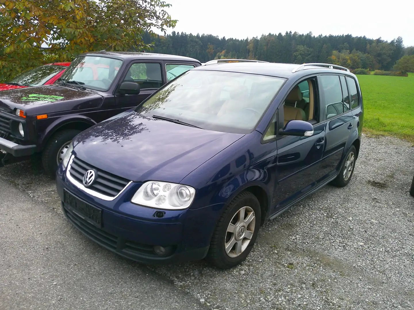Volkswagen Touran Highline 2,0 TDI DSG Kombi Blau - 1