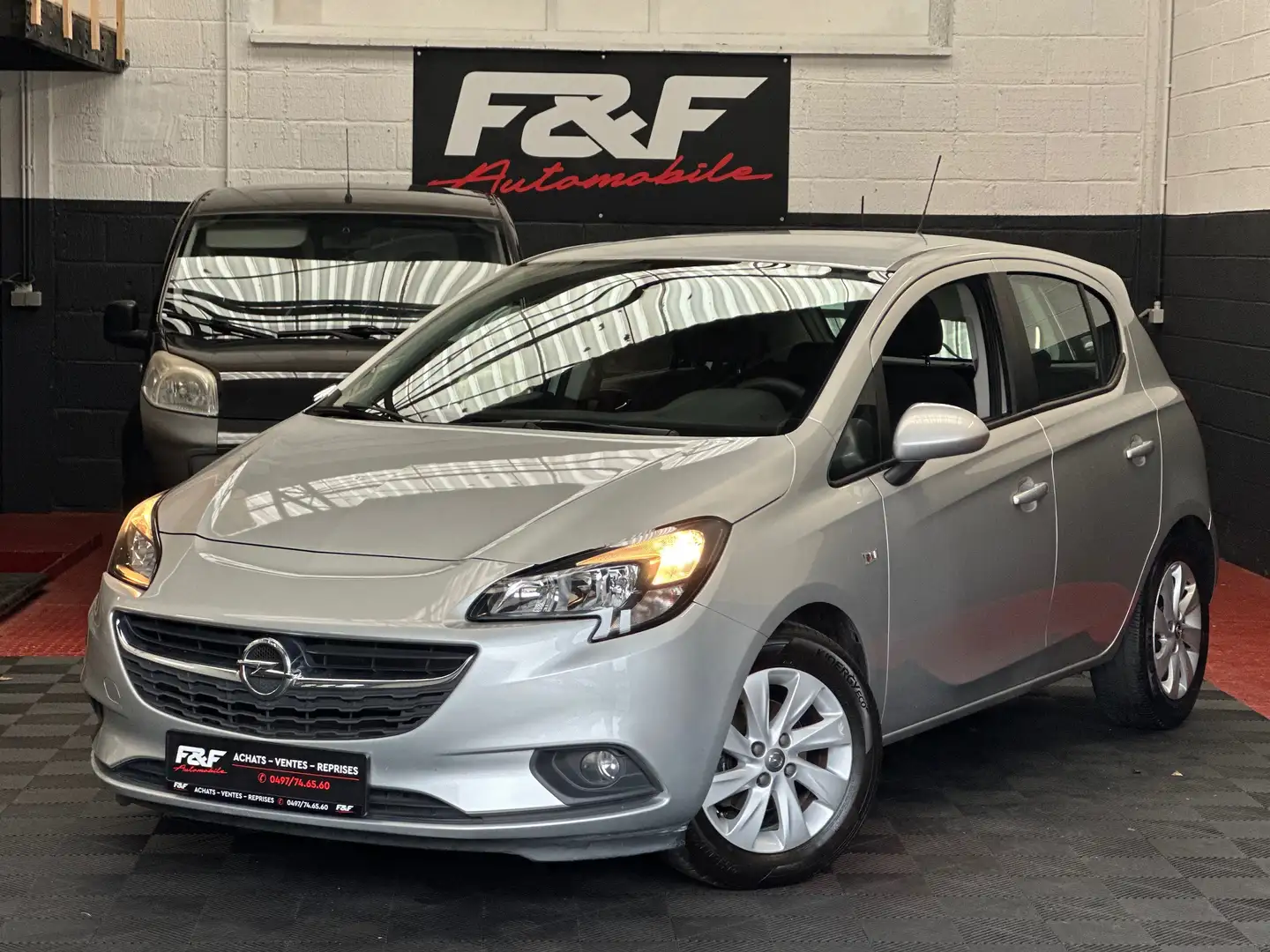 Opel Corsa Corsa 1.2i Enjoy Zilver - 1