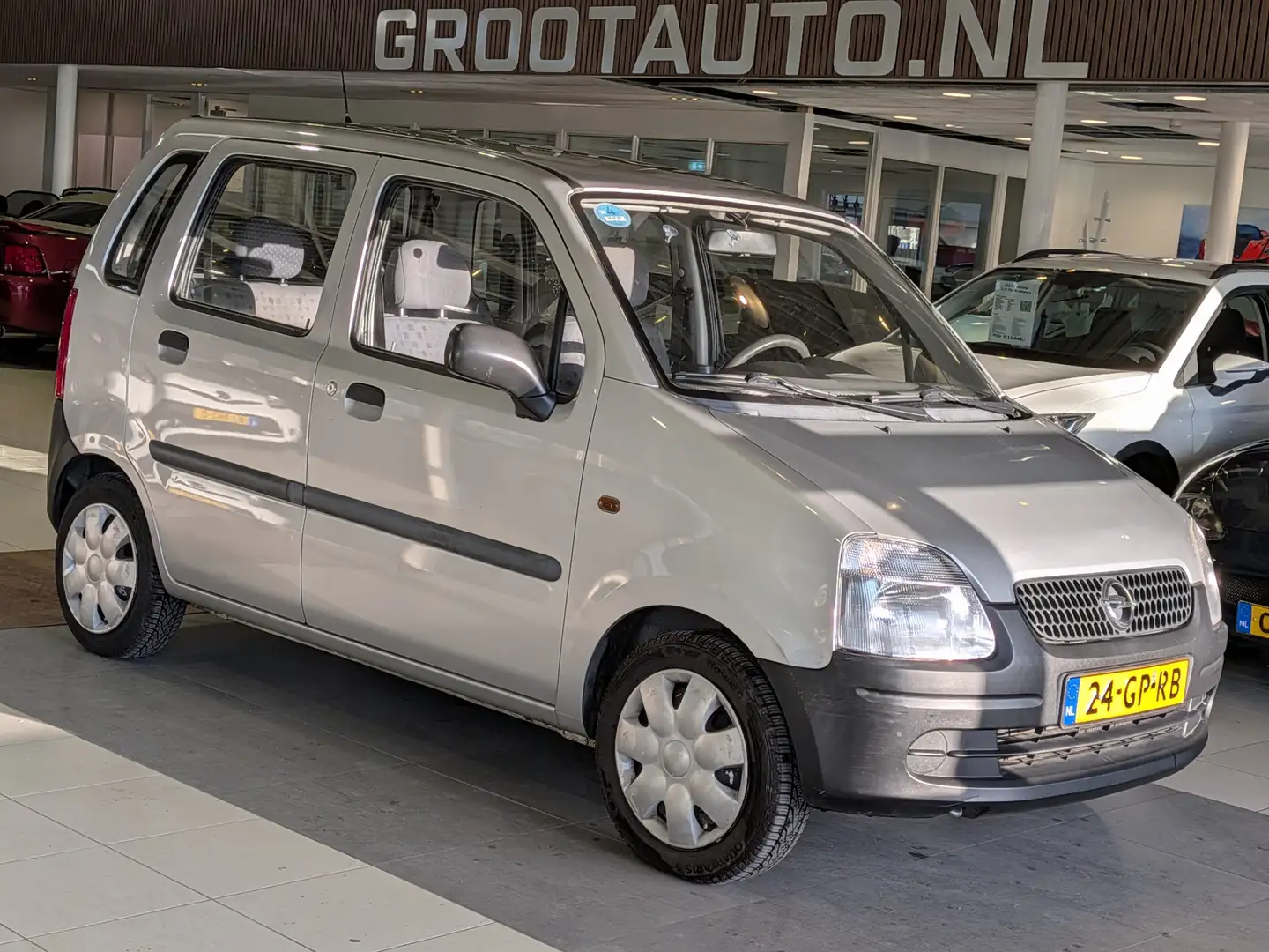 Opel Agila 1.0-12V NAP, Stuurbekrachtiging Grijs - 1