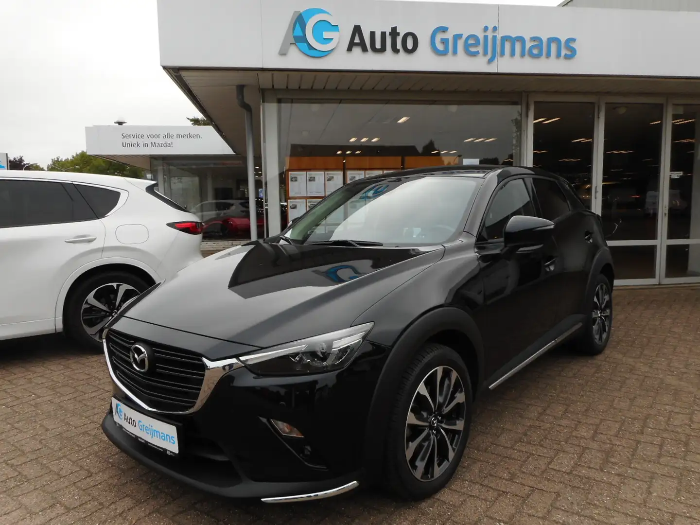 Mazda CX-3 2.0 SkyActiv-G 121 Luxury Zwart - 1
