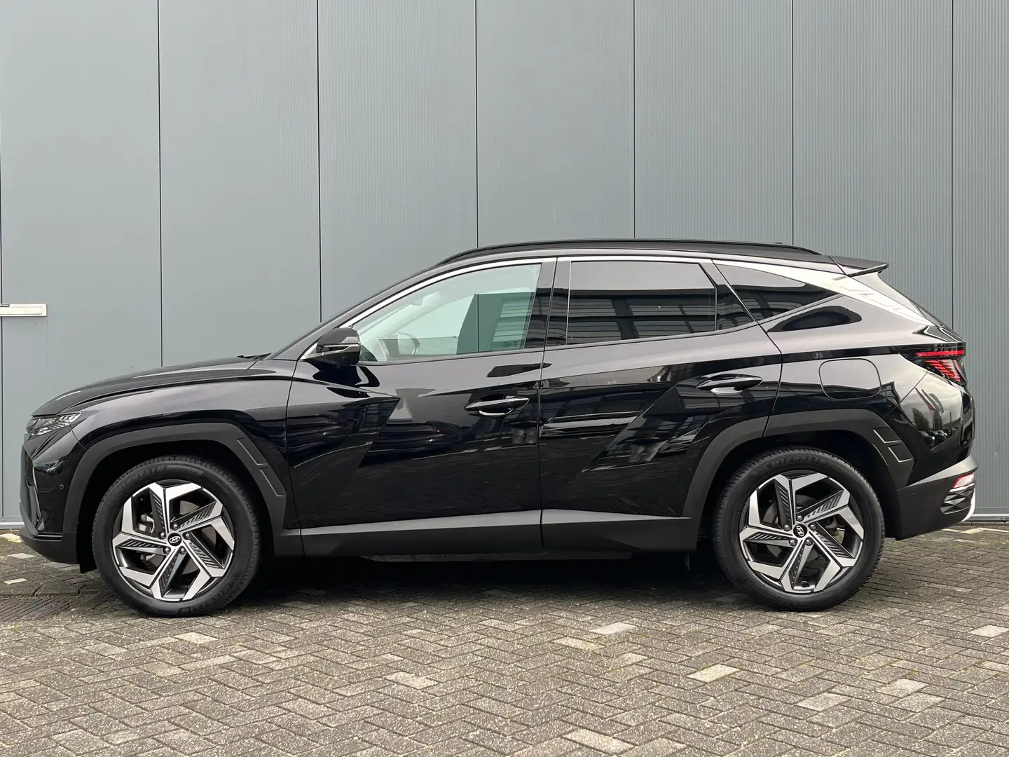 Hyundai TUCSON 1.6 T-GDI 265pk PHEV Premium 4WD (299,- p/m Demo D Noir - 2
