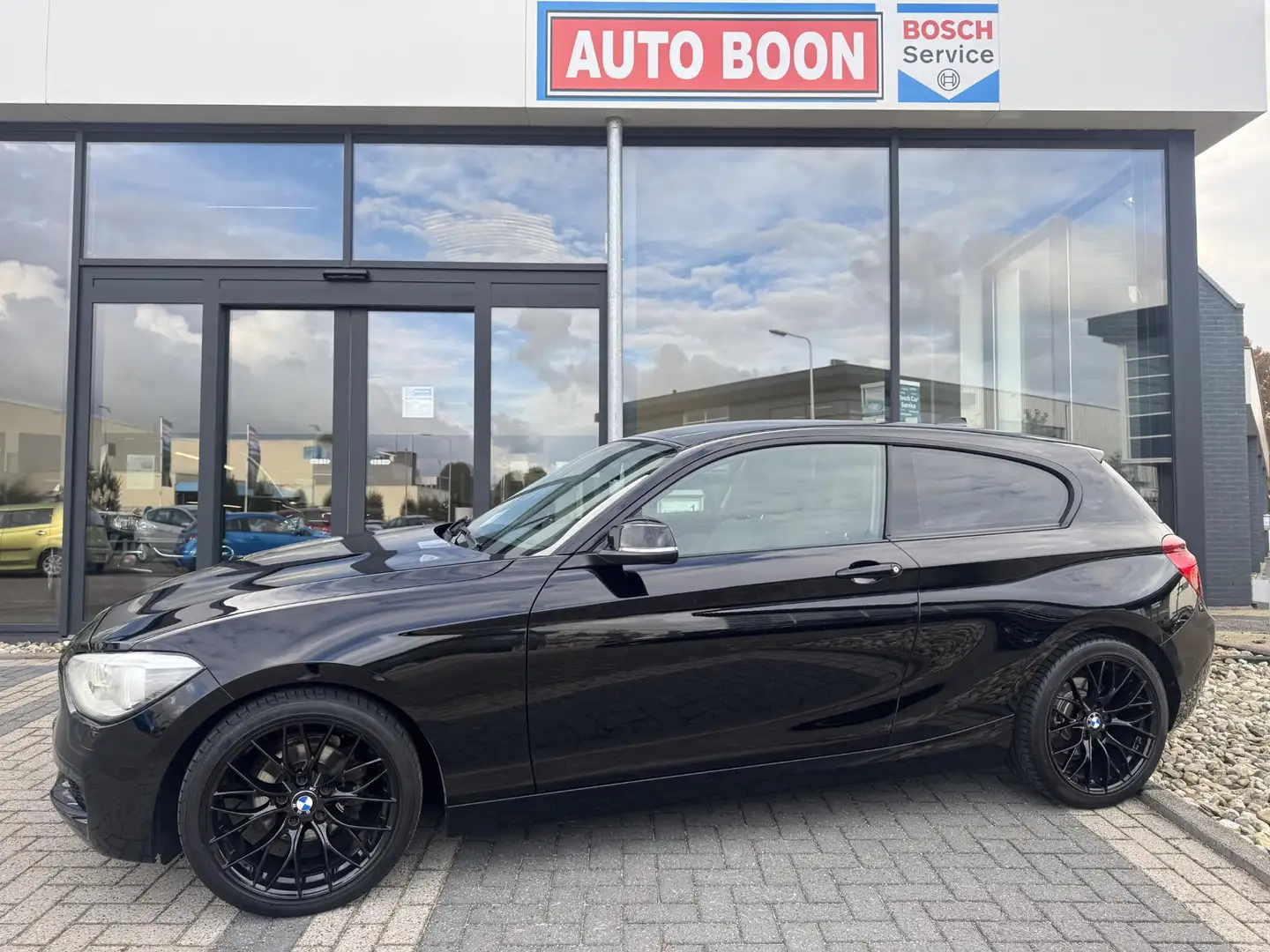 BMW 114 1-serie 114i FULL OPTION : LEER/NAVI/PDC/S&S/MEDIA Nero - 1