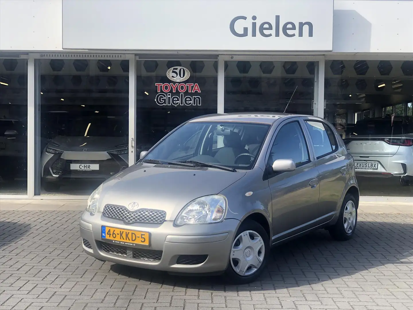 Toyota Yaris 1.3 Sol Automaat | Airco, Elektrische ramen voor, Grijs - 1