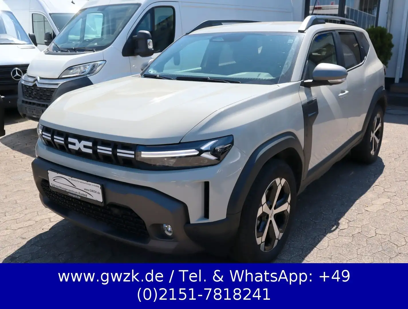 Dacia Duster III Hybrid 140 Journey/Navi/360°Cam/Temp. Beige - 1