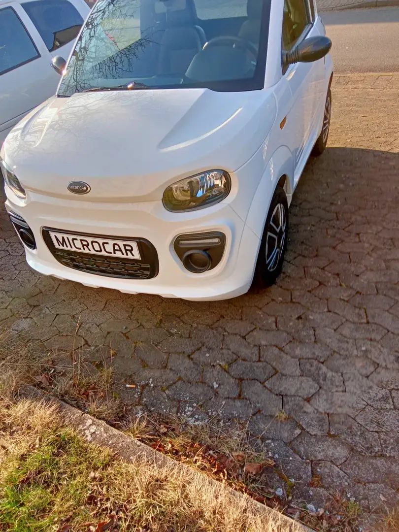 Microcar Due 6 Initial - 1