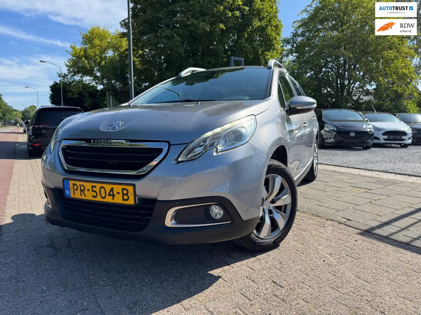 Peugeot 2008 1.2 VTi Access A-C Elek Pakket Lmv Navi Cruise Pdc Gris - 1