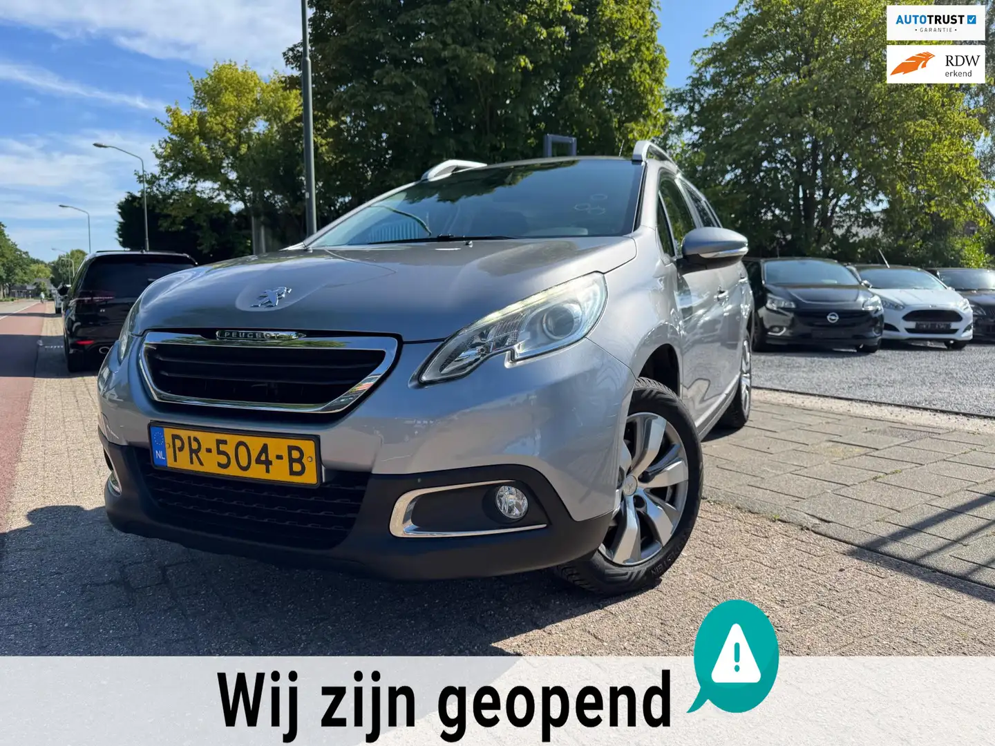 Peugeot 2008 1.2 VTi Access A-C Elek Pakket Lmv Navi Cruise Pdc Grijs - 1