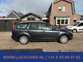 Ford Focus Wagon 1.8 Titanium Flexi Fuel NIEUWE APK! Grau - thumbnail 5