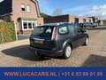 Ford Focus Wagon 1.8 Titanium Flexi Fuel NIEUWE APK! Grau - thumbnail 3