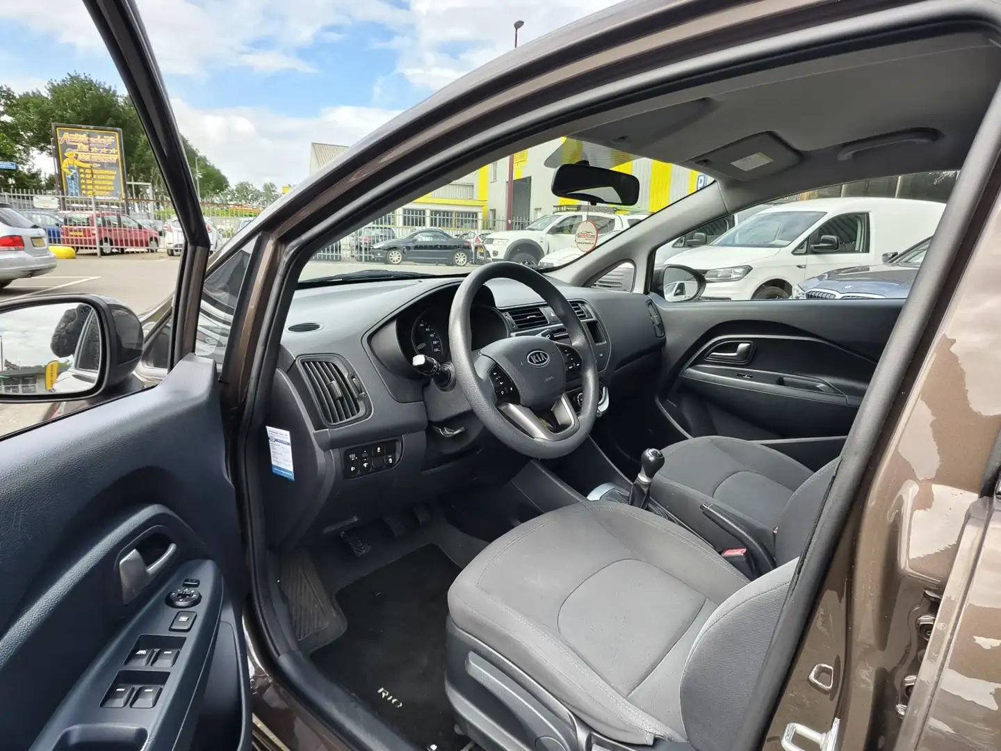 Kia Rio 1.2 CVVT Plus Pack / NAP / AIRCO / PDC / OHB / Brown - 2