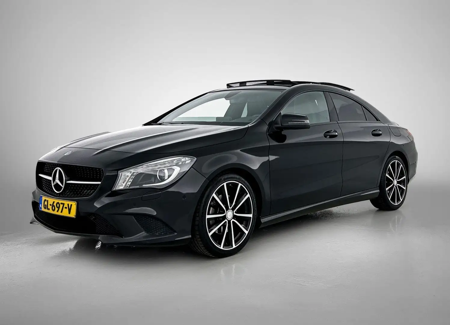 Mercedes-Benz CLA 180 Ambition SPORT (NL-auto, Goed ondH, Panoramadak, C Zwart - 1