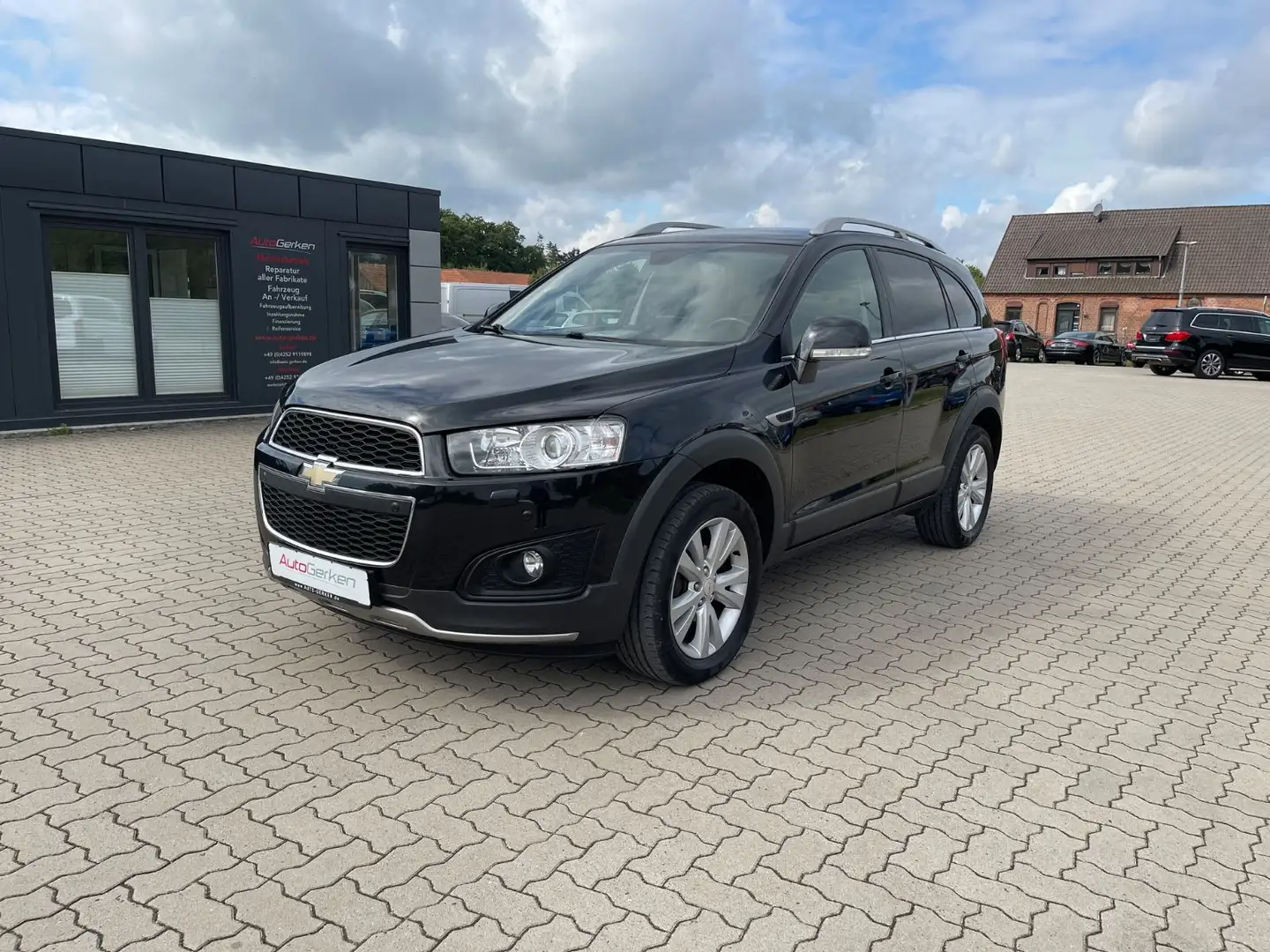 Chevrolet Captiva 2.2 D LT+ 1HD TÜV NEU Leder 7-Sitzer Schwarz - 1