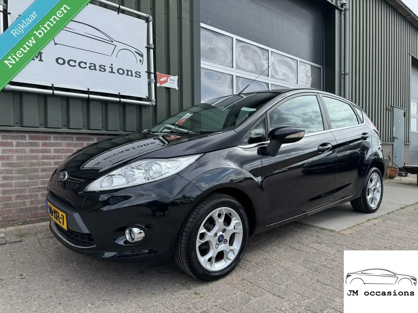 Ford Fiesta 1.25 Titanium|Cruise|Clima|Bleutooth|APK2-2026| Negro - 1