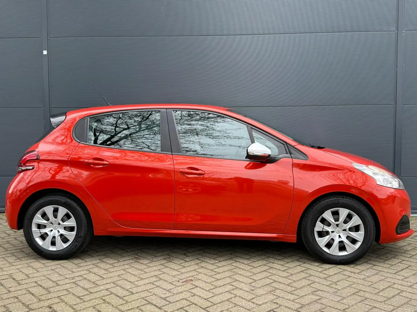 Peugeot 208 1.2 PureTech Like AIRCO| CRUISE | ELEK RAMEN | NWE Naranja - 2