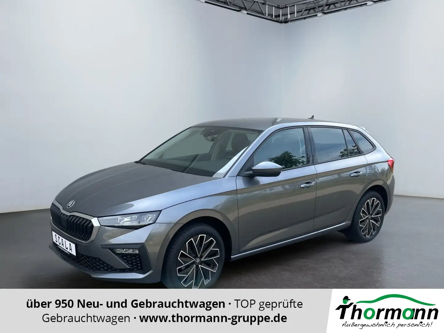 Skoda Scala Tour 1.0 TSI DSG ACC SpurH LED Navi Grigio - 1