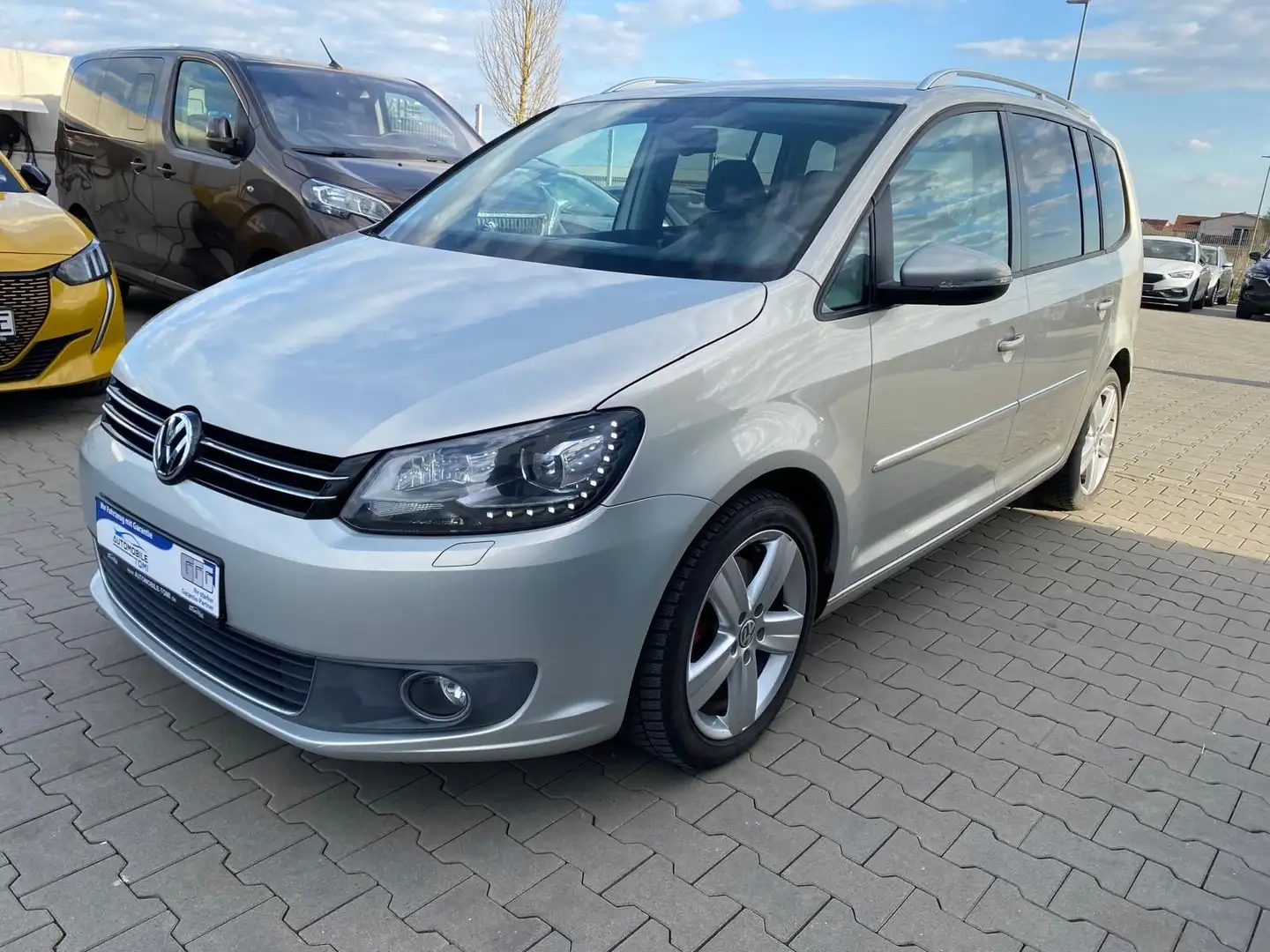 Volkswagen Touran HighlineIXenon/NAVI/7SITZE Silber - 1