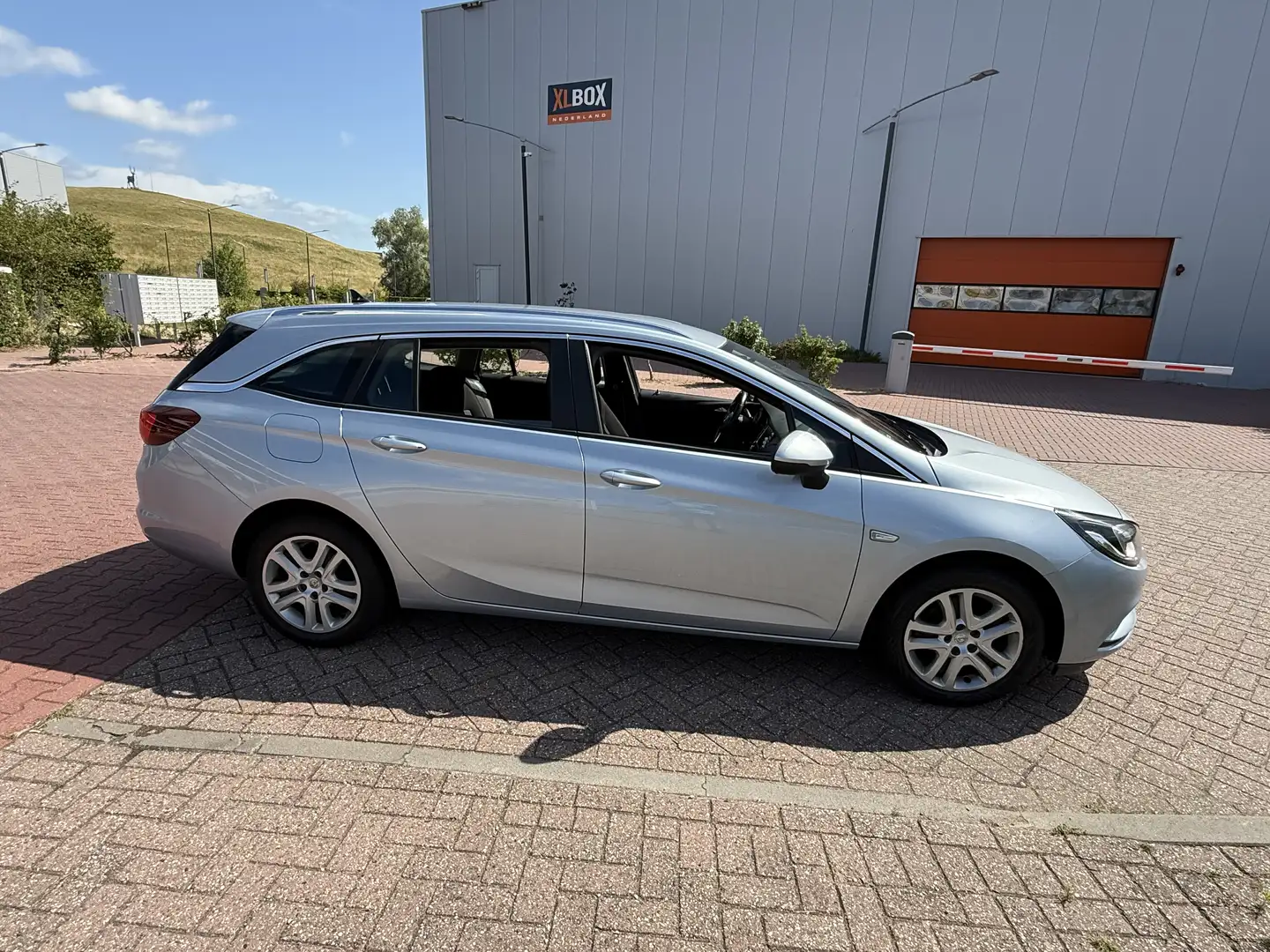 Opel Astra Opel Astra 1.0 Business Apple CarPlay 2016 Grijs - 1