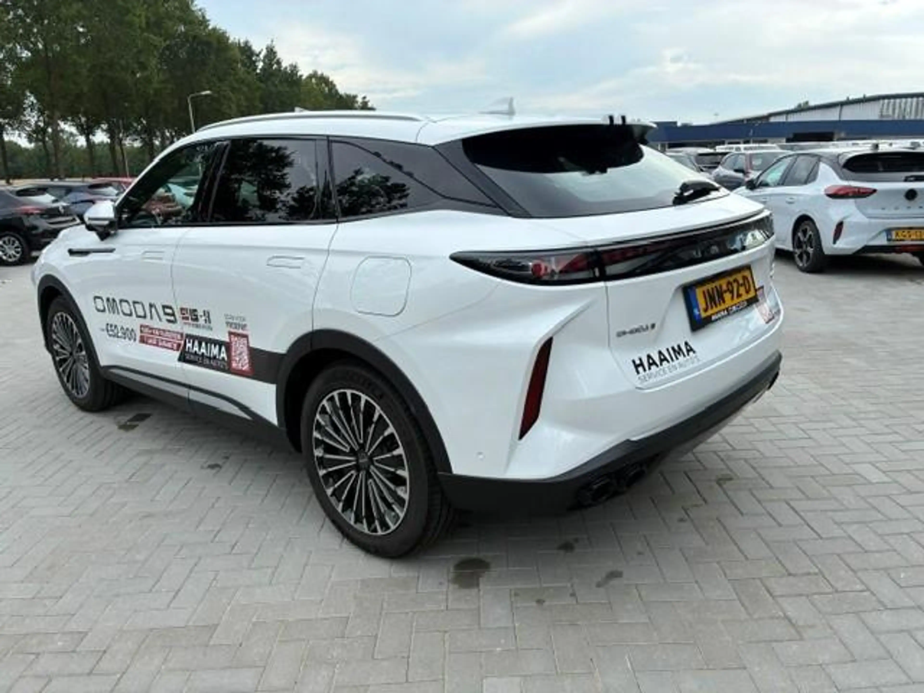 Omoda 9 Super Hybrid System 537 PK AWD | 7 jaar garantie | — photo 7