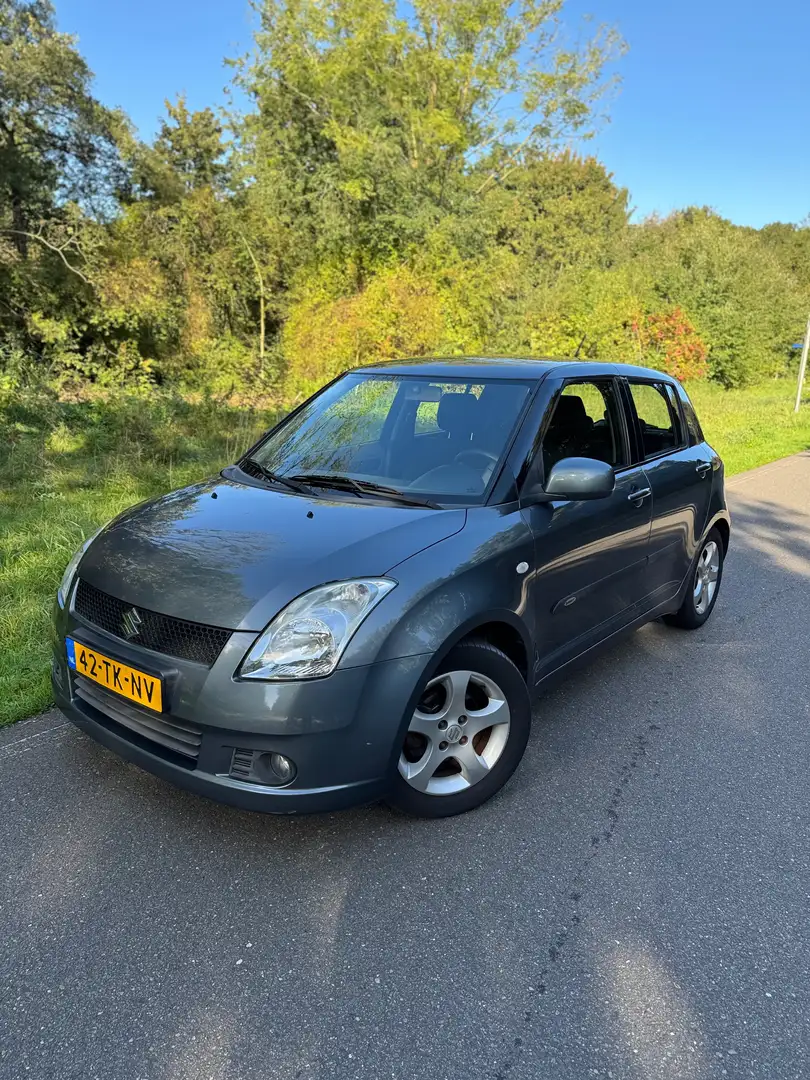 Suzuki Swift 1.3 Shogun Grijs - 2