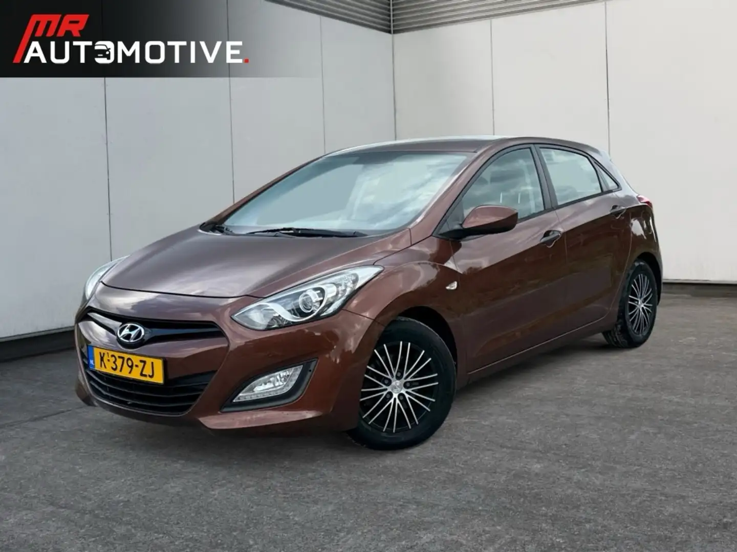 Hyundai i30 1.4 iMotion Business - Airco, Lichtmetalen velgen, Orange - 1