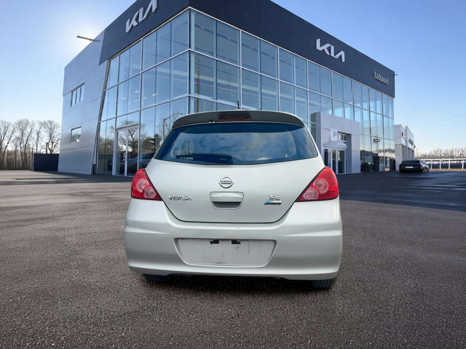 used 2012 Nissan Versa car, priced at $4,999