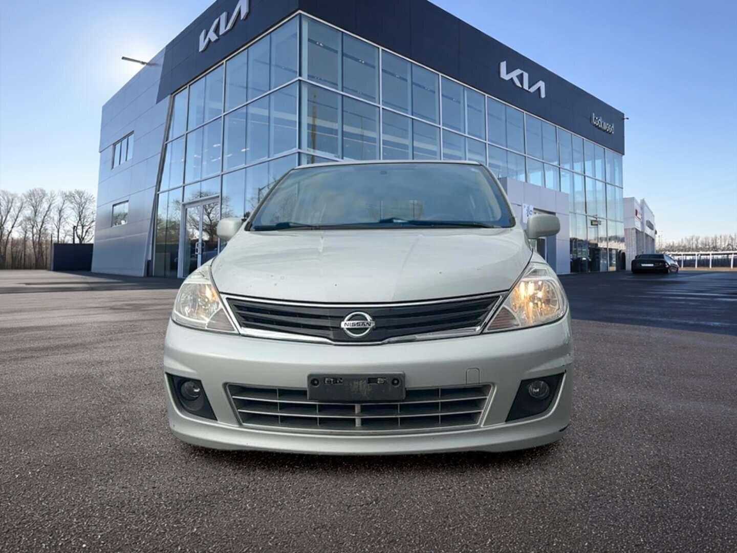 used 2012 Nissan Versa car, priced at $4,999