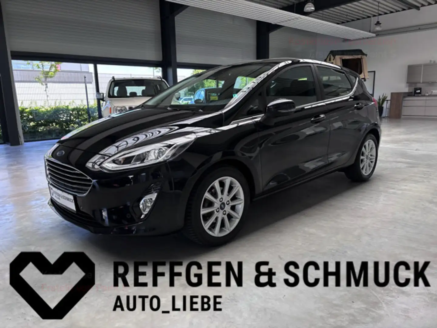 Ford Fiesta TITANIUM KLIMA+ALLWETTER+KAMERA+APPLE+1HD Noir - 1