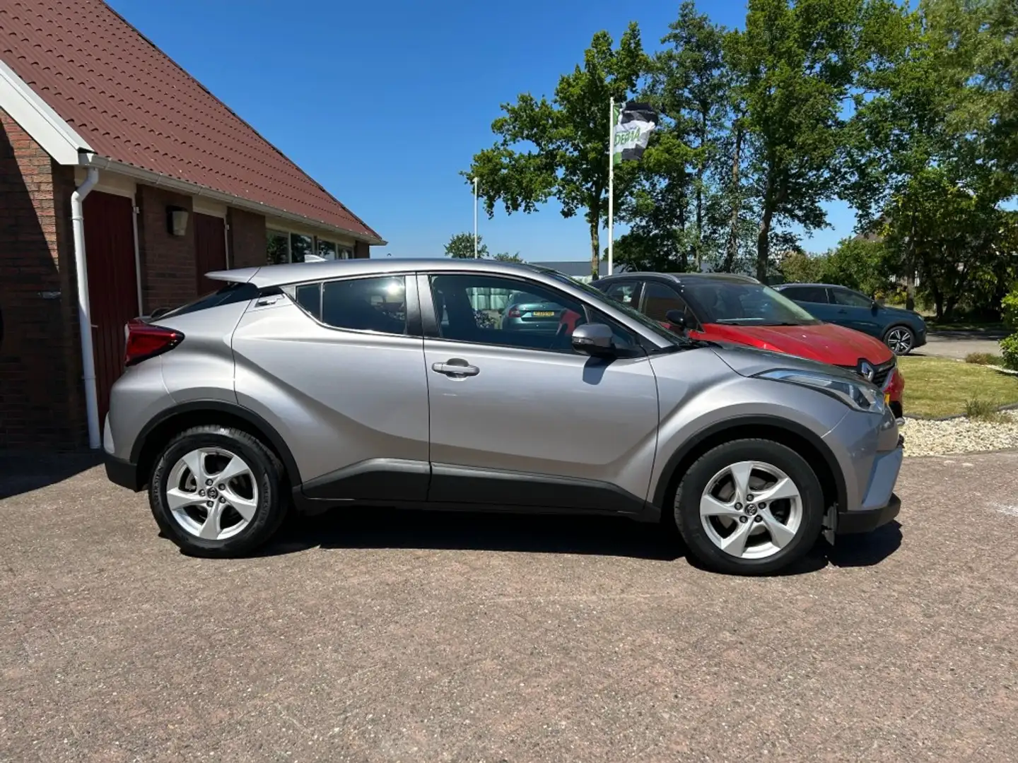 Toyota C-HR 1.2 DYNAMIC AUTOMAAT TREKHAAK/NAVIGATIE/CRUISE/ENZ Gris - 2