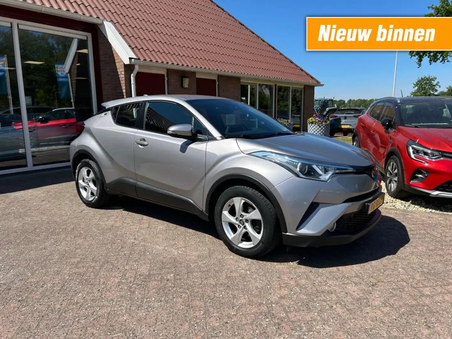 Toyota C-HR 1.2 DYNAMIC AUTOMAAT TREKHAAK/NAVIGATIE/CRUISE/ENZ Gris - 1