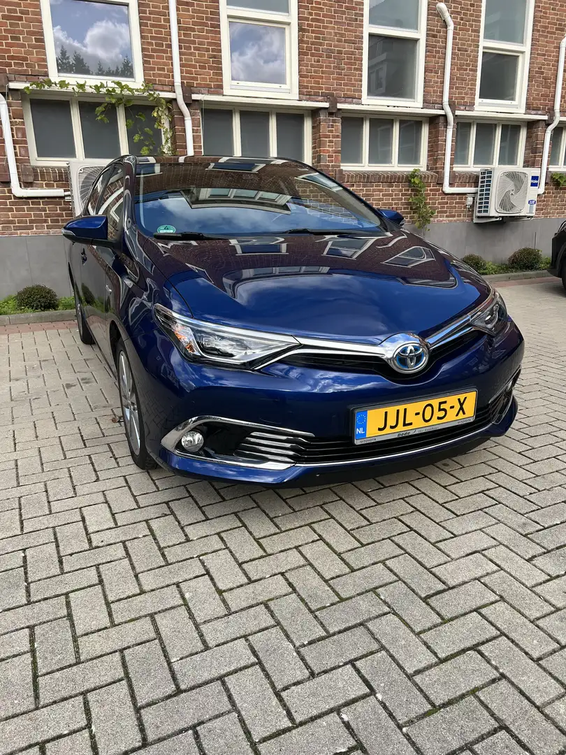Toyota Auris 1.8 Hybr. Executive Blauw - 1